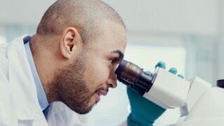 orion_research-and-development_man-detecting-microscope_2022_3475.jpg